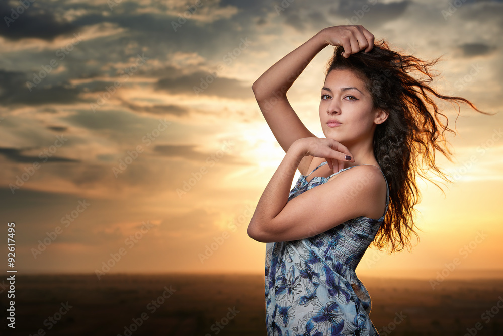 girl portrait at sunset on plain background girl portrait at sunset on plain background