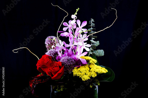 Fototapeta Naklejka Na Ścianę i Meble -  Elegant exotic floral centerpiece with artistic flair