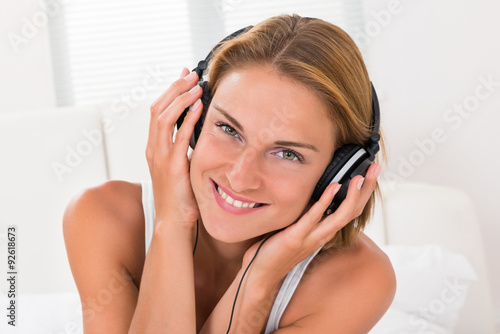 Woman Listening Music With Headphones