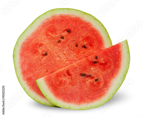 Two different slices of ripe watermelon standing next