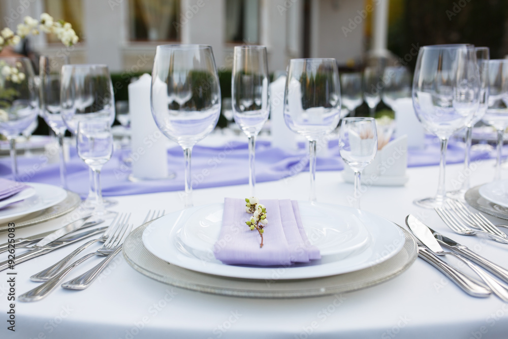 Table setting at a luxury wedding or another catered event Table setting at a luxury wedding or another catered event