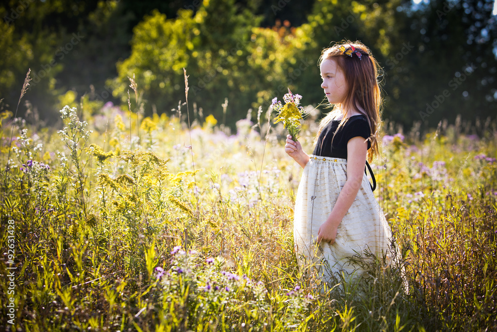 portrait of a little girl in the park portrait of a little girl in the park