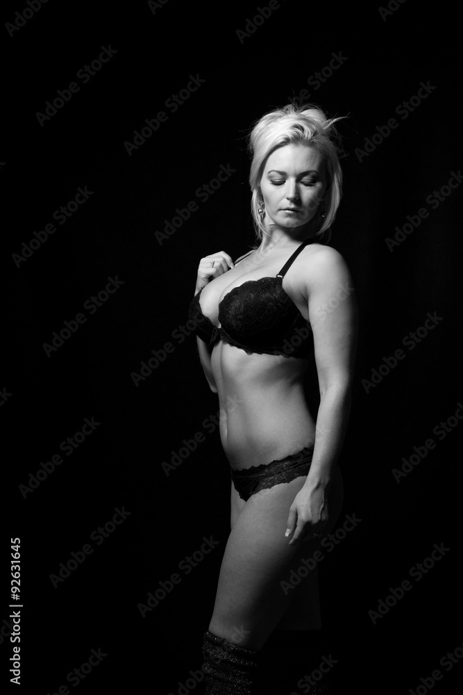 Obraz premium Physically Fit Caucasian Blonde Female