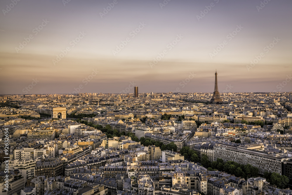 Sunset over Paris with Eiffel Tower and Arch de Triumphe