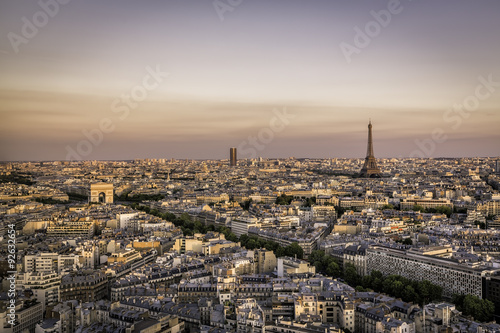 Sunset over Paris with Eiffel Tower and Arch de Triumphe © marchello74