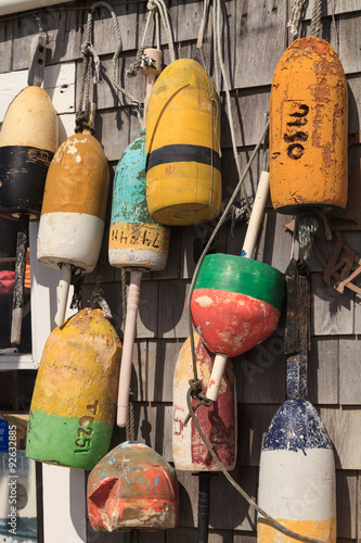 Buoys on a Cape Cod fishing shack in Massachusetts in summer photo