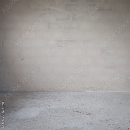 plaster mortar wall and cement floor in construction site