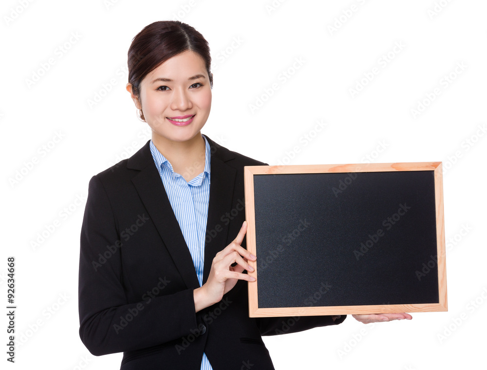 Businesswoman show with chalkboard Businesswoman show with chalkboard