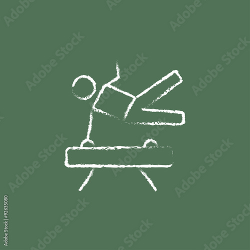 Gymnast on pommel horse icon drawn in chalk.