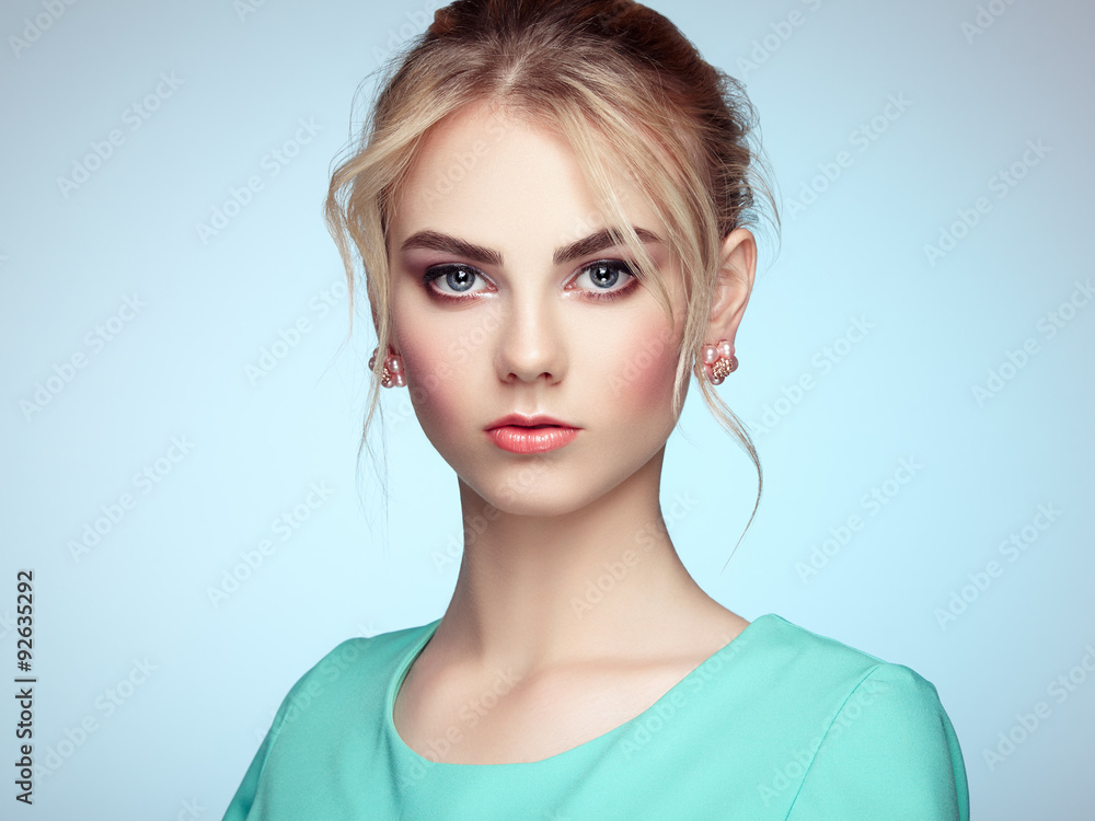 Portrait of beautiful sensual woman with elegant hairstyle. Perfect makeup. Blonde girl. Fashion photo Portrait of beautiful sensual woman with elegant hairstyle. Perfect makeup. Blonde girl. Fashion photo