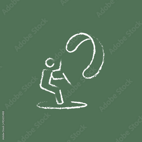 Kite surfing icon drawn in chalk.