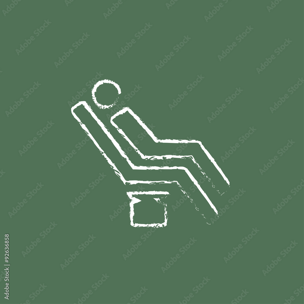 Man sitting on a dental chair icon drawn in chalk. Man sitting on a dental chair icon drawn in chalk.