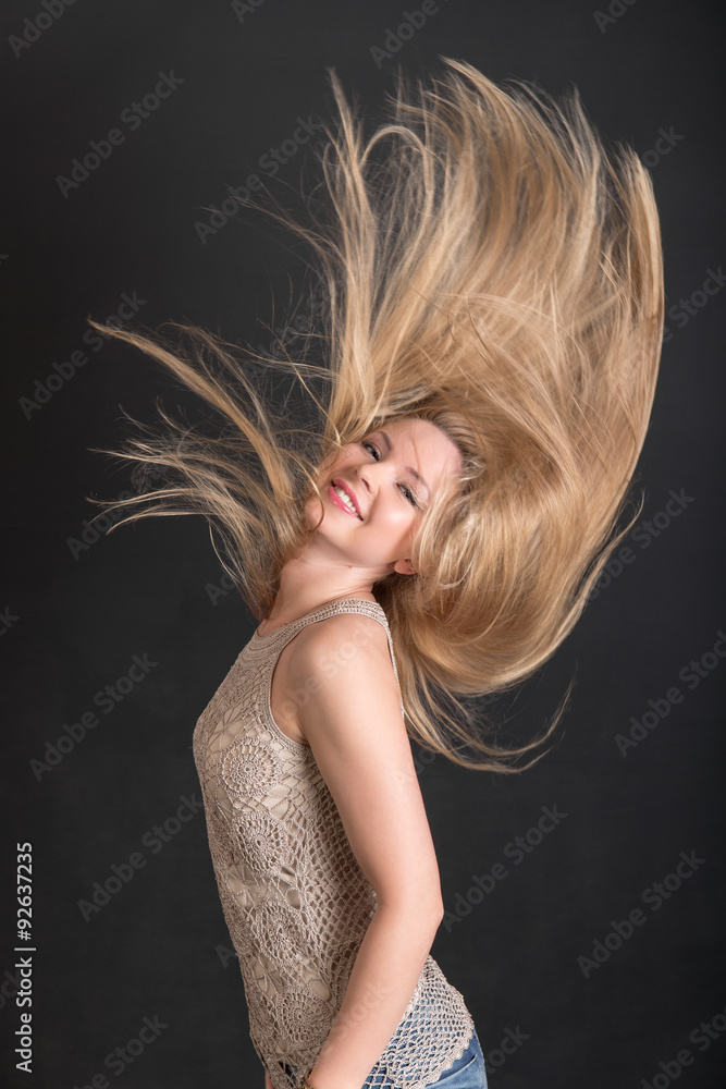 Naklejka premium cheerful blonde with long hair