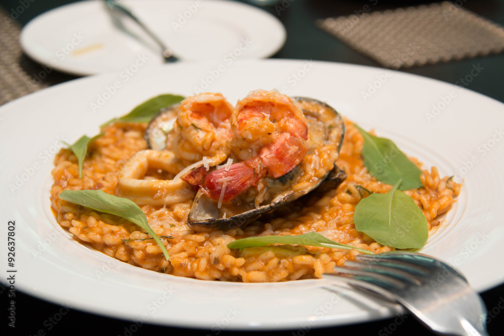 Risotto, rice with seafood, food closeup Risotto, rice with seafood, food closeup