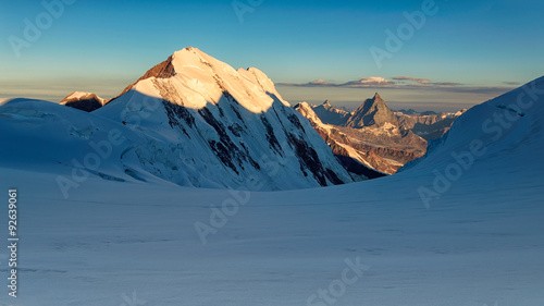 Panorama of sunrise at glacier with Lyskamm and Matterhorn