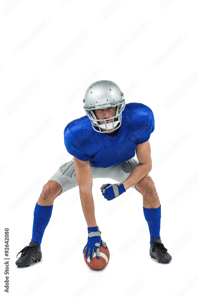 © WavebreakmediaMicro - American football player in attack stance © WavebreakmediaMicro - American football player in attack stance