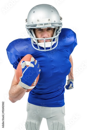 American football player running with ball