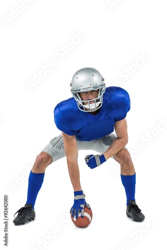 American football player in attack stance