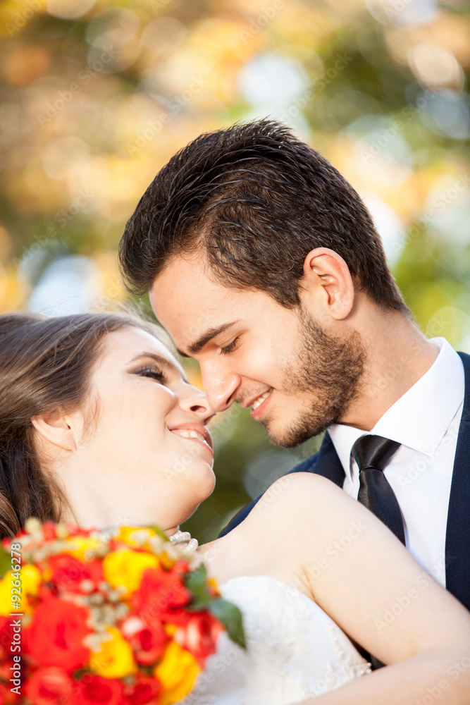 Bride and groom kissing each other Bride and groom kissing each other