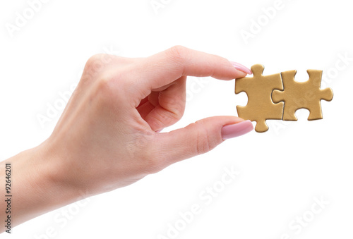 puzzle in hands isolated on white background