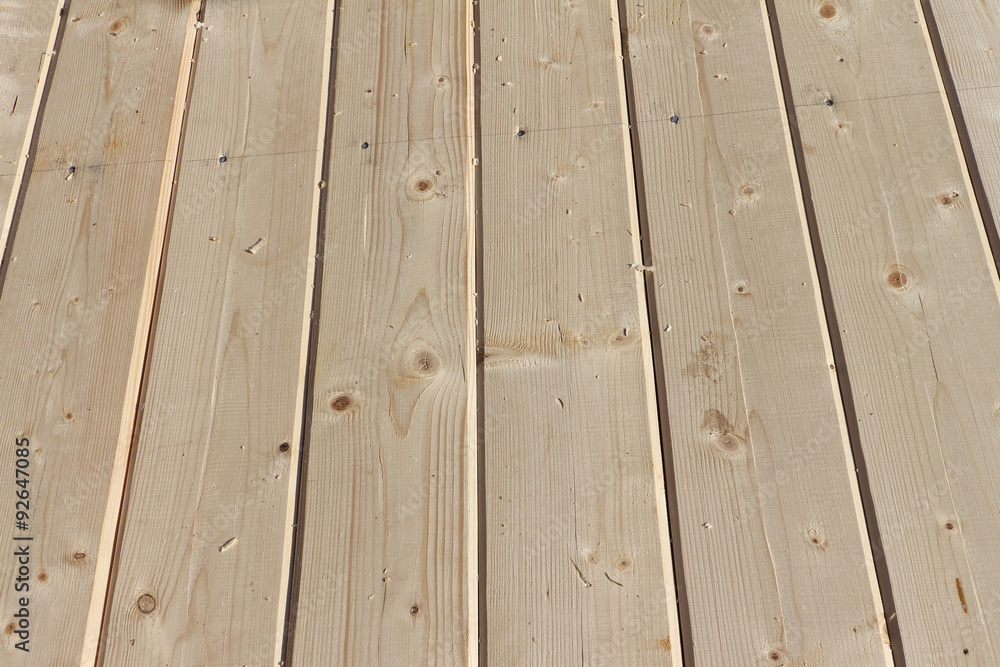 Floor from fresh pine boards
outdoors Floor from fresh pine boards
outdoors