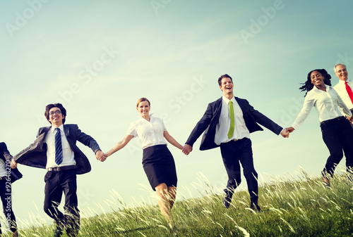 Business People Holding Hands Together Outdoors Concept