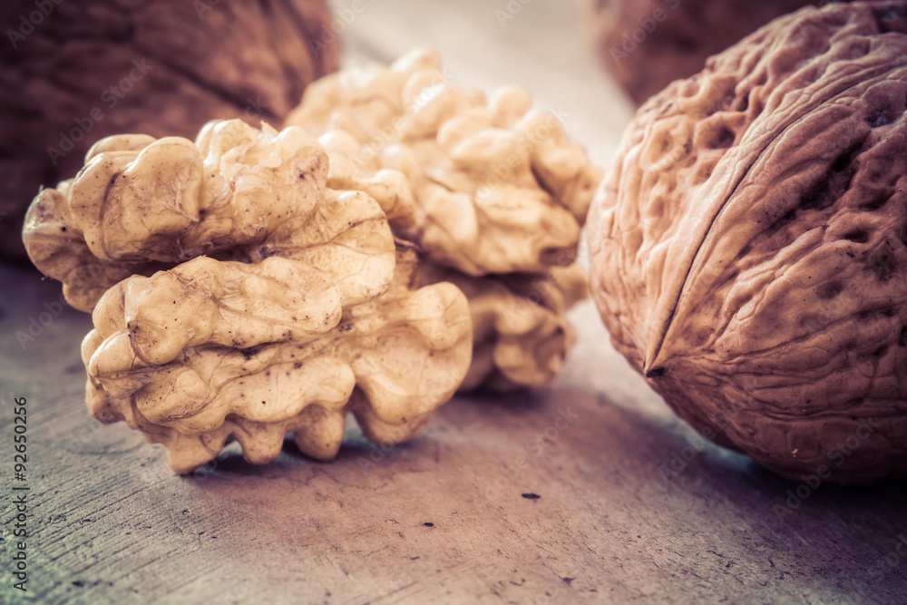 Walnuts on a wooden table. Walnuts on a wooden table.