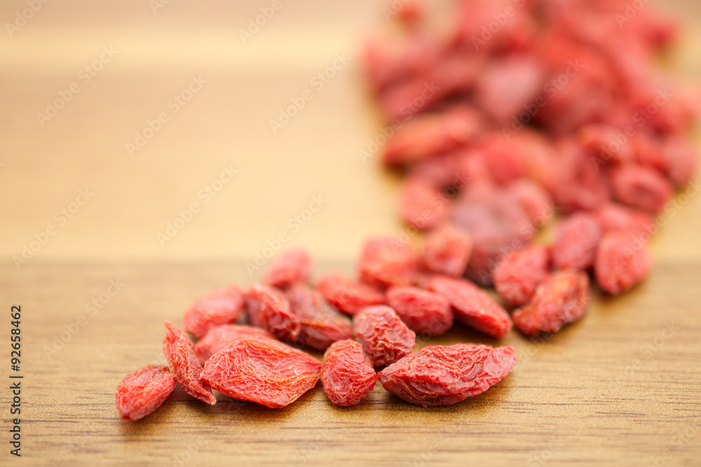 Goji berries on wooden background Goji berries on wooden background