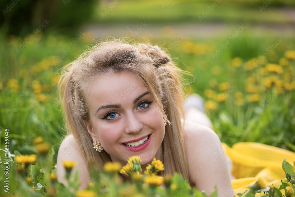 Portrait of the girl in dandelions Portrait of the girl in dandelions