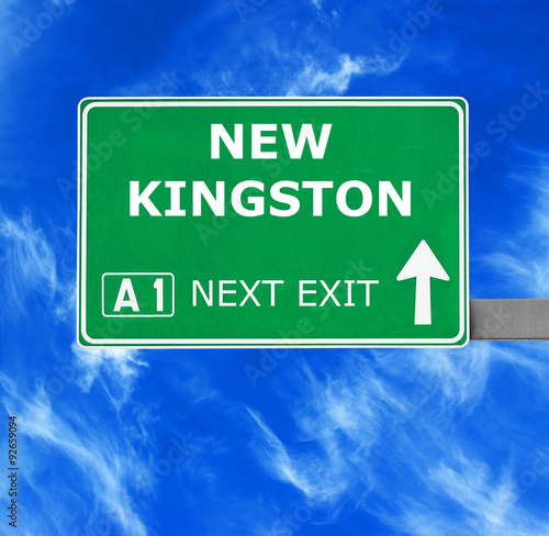 NEW KINGSTON road sign against clear blue sky