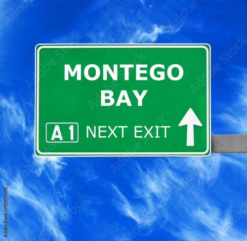 MONTEGO BAY road sign against clear blue sky
