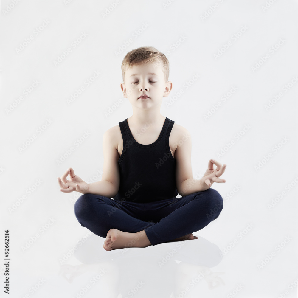 Yoga boy.child in the lotus position.meditation and relaxation Yoga boy.child in the lotus position.meditation and relaxation
