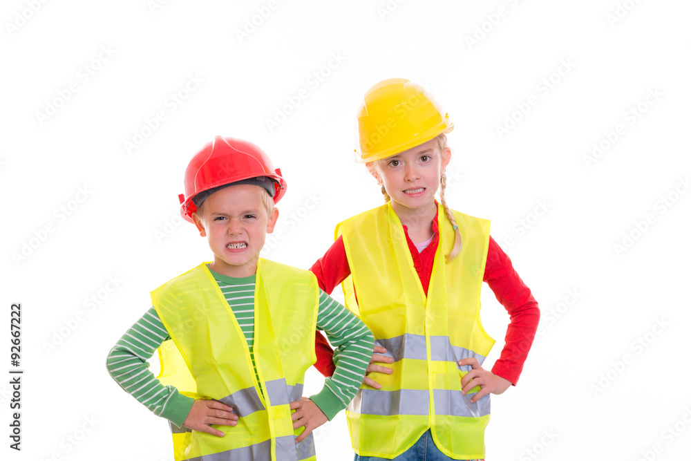 boy and girl with reflective vest and helmet boy and girl with reflective vest and helmet