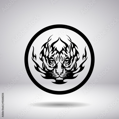 Fototapeta Naklejka Na Ścianę i Meble -  Silhouette of tiger head in a circle