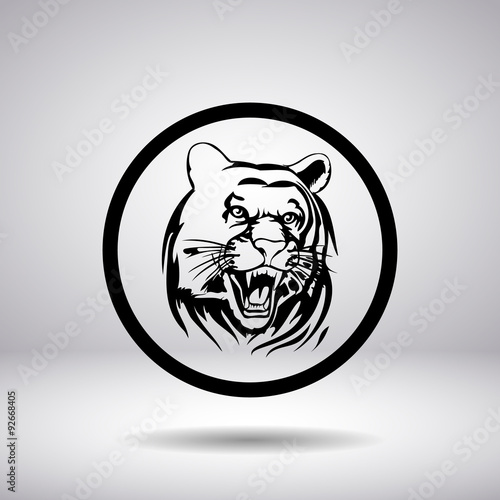 Fototapeta Naklejka Na Ścianę i Meble -  Silhouette of tiger head in a circle