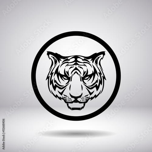 Fototapeta Naklejka Na Ścianę i Meble -  Silhouette of tiger head in a circle