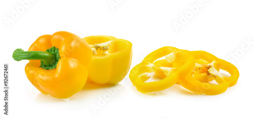 Sliced yellow paprika pepper isolated on white background photo