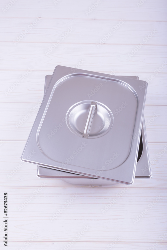 metal containers for food preparation, food industrial capacity. cruet stand food with a lid. metal containers for food preparation, food industrial capacity. cruet stand food with a lid.