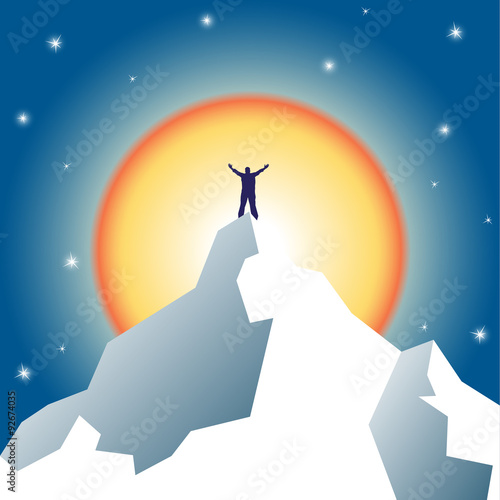 Businessman holding on top of mountain