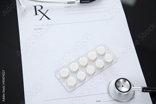 Wallpaper Mural Stethoscope and prescription and pills, black reflective background Torontodigital.ca