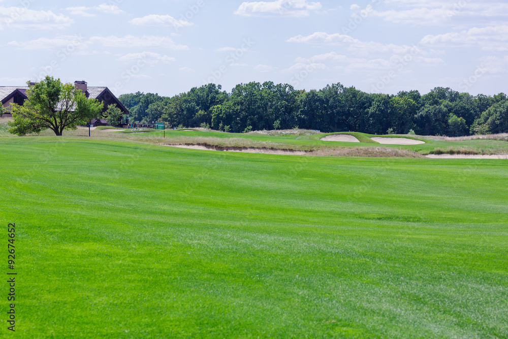 Perfect wavy green ground on a golf course Perfect wavy green ground on a golf course