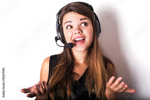 Portrait of happy cheerful beautiful young support phone operato photo