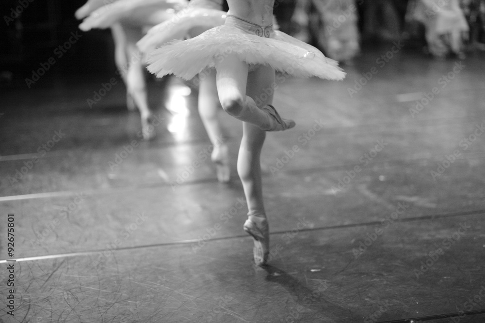 Naklejka premium Elegant and effortless-looking pirouettes, low section of ballerinas