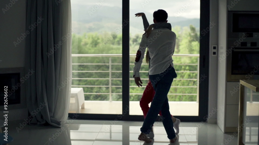 Young couple in love, hugging by window at home, slow motion 240fps
Young couple in love, hugging by window at home, slow motion 240fps