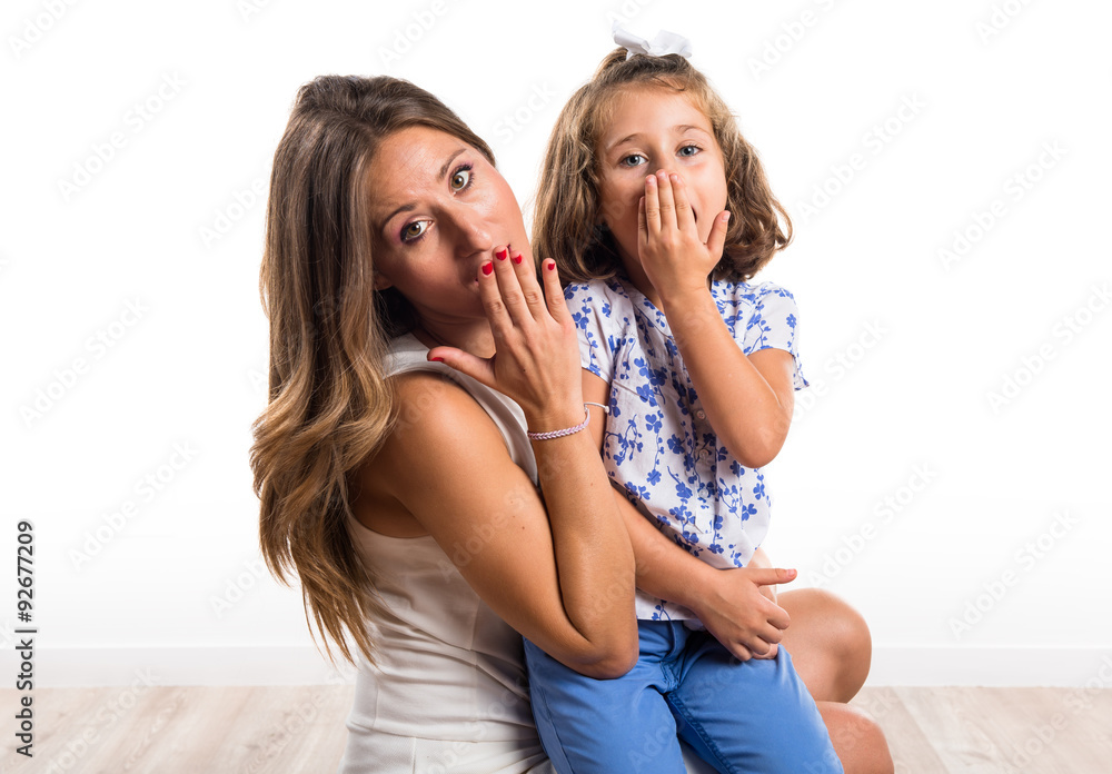 Mother and daughter doing surprise gesture Mother and daughter doing surprise gesture