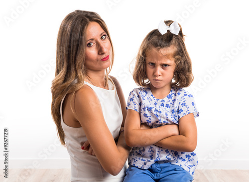Sad mother and daughter