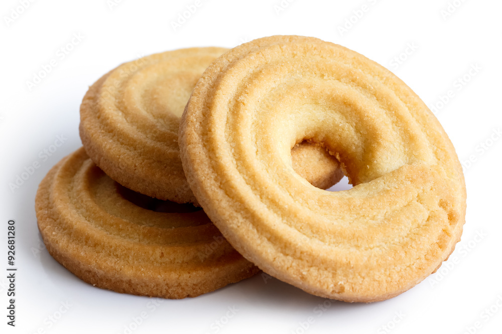 Three butter ring biscuits isolated on white in perspective. Three butter ring biscuits isolated on white in perspective.