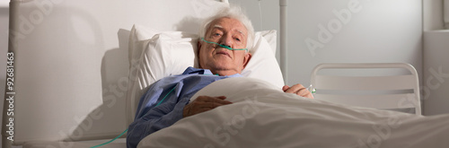 Elder man in bed
