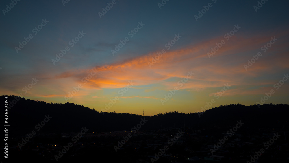 AMPANG, MALAYSIA - 17TH DECEMBER 2013; Dramatic sunrise over Ampang city in Kuala Lumpur, Malaysia. AMPANG, MALAYSIA - 17TH DECEMBER 2013; Dramatic sunrise over Ampang city in Kuala Lumpur, Malaysia.