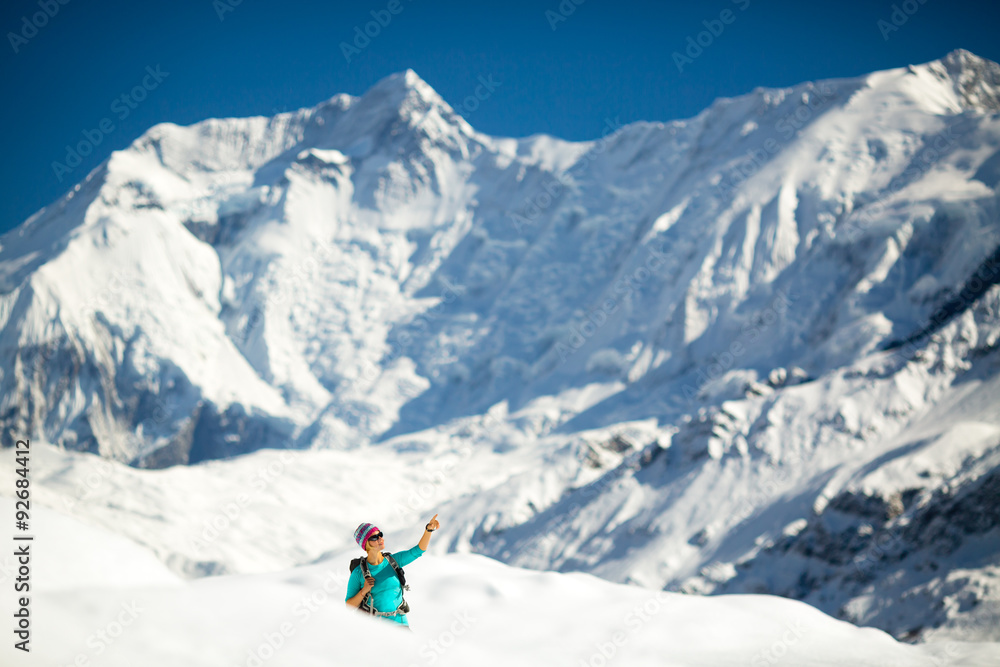 Woman success portrait on mountain peak